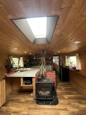 The 21kW multi-fuel stove keeps the space warm and inviting, even in deep winter.