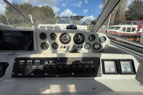 Control panel of a 1991 Sealine 290 Ambassador boat with gauges and switches.