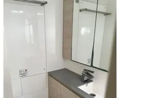 Modern bathroom in 2021 Leopard 50 yacht with sleek fixtures and minimalist design.