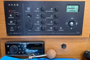 Control panel of a 2020 Jeanneau Sun Odyssey 389 sailboat, featuring various switches and a display.