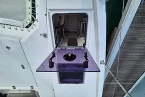 Hatch opening on a 2020 Leopard 45 catamaran, showcasing interior access and deck details.