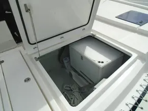 Storage compartment on a 2017 Leopard 45 catamaran with ropes and equipment.