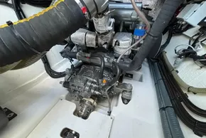 Engine compartment of 2024 Leopard 40 Powercat, showcasing mechanical components and wiring.