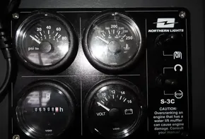 Control panel of a 2017 Leopard 45 with Northern Lights S-3C engine gauges.