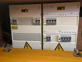 Electrical panel on a 2019 Jeanneau Sun Odyssey 440 sailboat, featuring circuit breakers.