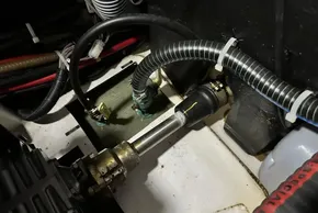 Engine compartment of 2023 Beneteau Oceanis 51.1 yacht, showing mechanical components and wiring.