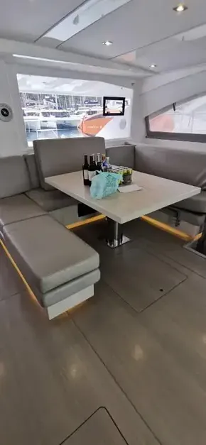 Interior of 2019 Leopard 51 Powercat with dining area and modern seating.