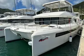 2025 Robertson and Caine Leopard 46 Powercat docked at marina, featuring sleek design and spacious deck.