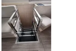 Interior of 2019 Leopard 50 yacht with sleek metal staircase and modern design.