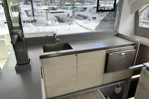 Modern kitchen on a 2021 Leopard 50 yacht, featuring sleek countertops and stainless steel appliances.