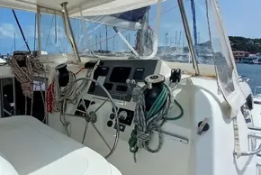 Cockpit of 2017 Leopard 48 yacht with steering wheel and navigation equipment.