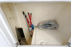 Storage compartment on a 2020 Leopard 50 boat with anchor and equipment.