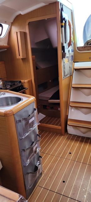 Galley storage pockets for crew essentials including lifelines