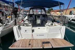 2020 Jeanneau Sun Odyssey 389 sailboat docked at marina, featuring dual steering wheels.
