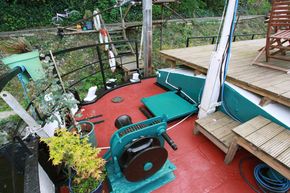 bow section of boat with winch and front hatch
