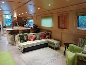 Living room, with kitchen behind