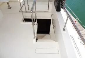 Staircase on 2017 Leopard 43 Powercat yacht leading to lower deck.