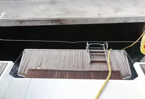 Beneteau Oceanis 46.1 2020 yacht stern with swim platform and ladder at dock.