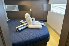 Luxurious cabin interior of 2025 Robertson and Caine Leopard 46 Powercat with towel art.