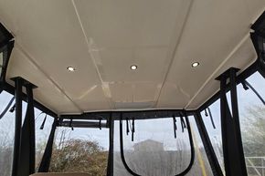 Interior view of 2023 Balt 818 Titanium boat ceiling with recessed lighting.