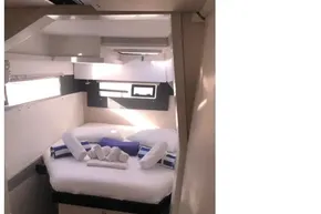 Cozy cabin interior of 2020 Leopard 40 yacht with neatly arranged towels.