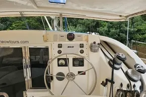 Steering wheel and controls of a 2008 Leopard 40 catamaran yacht.