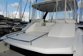 2018 Leopard 43 Powercat yacht docked at marina with clear skies.