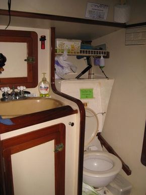 The Head includes large cabinets, Lavac Head, and shower pan.