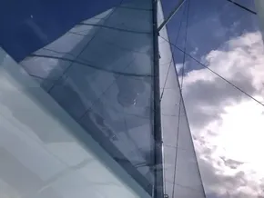 Sailing on a 2020 Leopard 45 catamaran under clear skies.