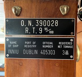 UK registration plate above and Irish Ships Registration below