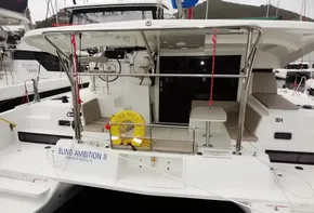 Lagoon 42 catamaran, 2020 model, named Blind Ambition II docked at a marina.