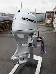 NEW HONDA BF50LRTU OUTBOARD ENGINE. SOME DAMAGE