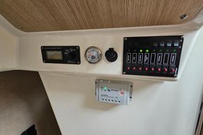 Control panel of 2023 Balt 818 Titanium boat with gauges and switches.