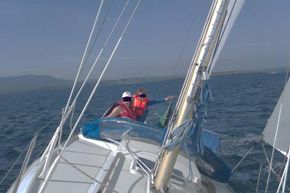 Family sailing off Schull