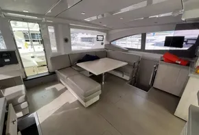 2019 Leopard 51 Powercat interior with modern seating and dining area.