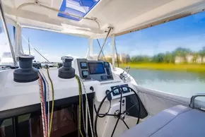 Interior of 2022 Leopard 50 yacht cockpit with navigation equipment and steering wheel.
