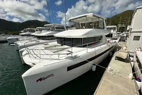 2025 Robertson and Caine Leopard 46 Powercat docked at marina, clear sky background.