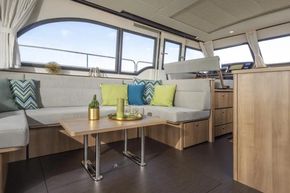Luxurious interior of 2025 Linssen 45 SL Sedan yacht with modern seating and decor.