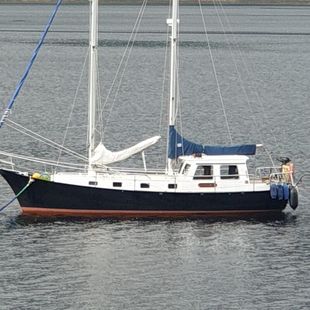 Fisher  37   Banjer style. Long keel, wheelhouse  Motor sailer. Steel.