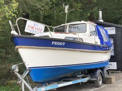 Lovely Hardy Pilot 20 SE with 2018 outboard
