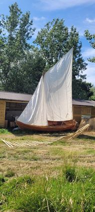 Half decked sailing   rowing boat