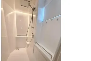 Modern shower area in 2021 Leopard 50 yacht, featuring sleek design and fixtures.