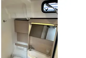 Modern bathroom in 2023 Beneteau Oceanis 51.1 yacht with sleek fixtures and compact design.