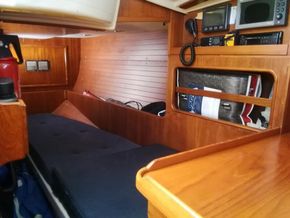 comfortable quarter berth with hatch and shelf