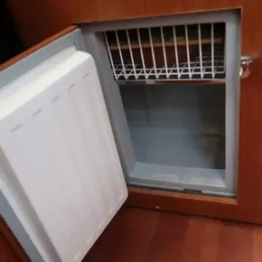 Open fridge in 2019 Beneteau Oceanis 41.1 yacht interior.
