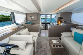 Luxurious interior of 2025 Leopard 40 Powercat yacht with modern furnishings and ocean view.