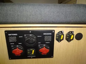 Control panel of a 2017 Beneteau Oceanis 45 sailboat, featuring battery and breaker switches.