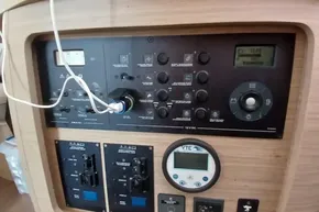Control panel of a 2024 Lagoon 42 yacht, featuring various switches and displays.