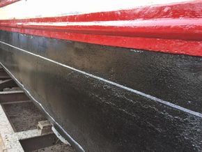 Close-up of a restored 1927 Classic Dutch Barge hull.