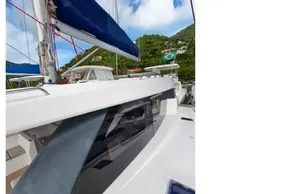 2019 Leopard 50 yacht with sleek design and modern features, docked in a scenic marina.